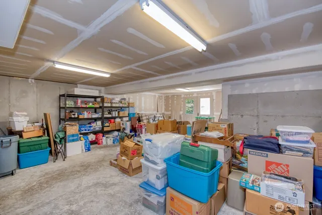 a living room with lots of furniture and a flat screen tv