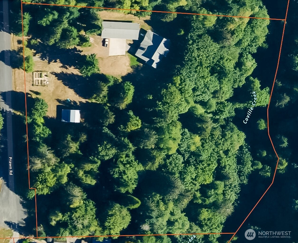 163 Prawn Road Port Angeles, WA 98363 - Photo 39 of 40 an aerial view of a house with lots of trees