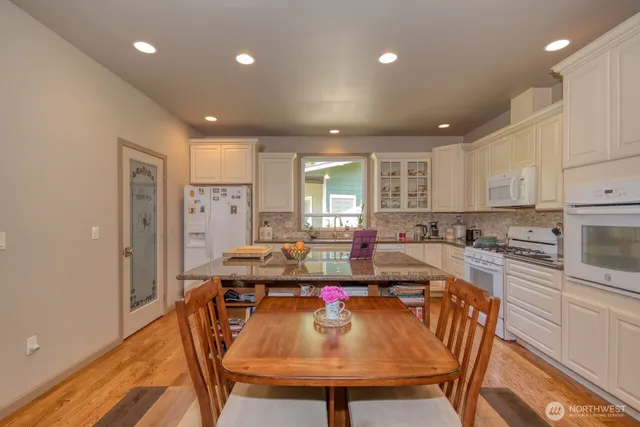 a view of a dining room with furniture