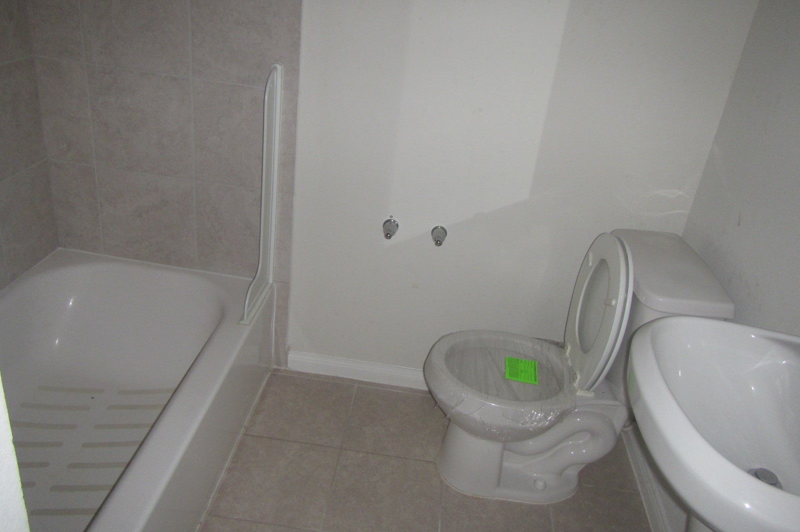 28612 Netawake Court Point Blank, TX 77364 - Photo 13 of 14 a bathroom with a sink and a toilet