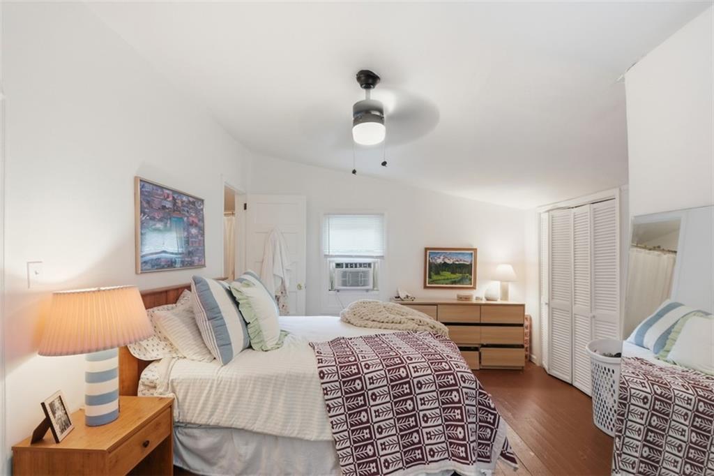 1424 Emory Road Northeast Atlanta, GA 30306 - Photo 35 of 36 a bedroom with bed and wooden floor