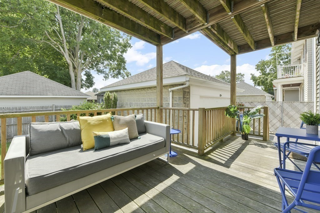 64 Parmenter Road, Unit 1 Waltham, MA 02453 - Photo 19 of 25 a view of sitting area with furniture and wooden deck