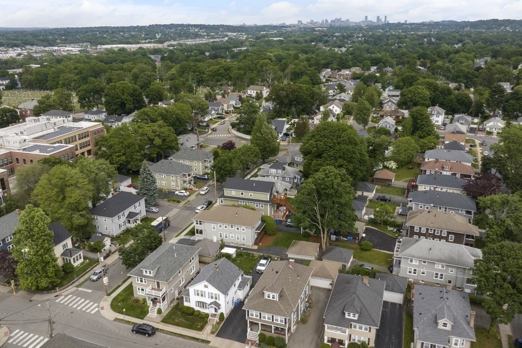 64 Parmenter Road, Unit 1 Waltham, MA 02453 - Photo 23 of 25 an aerial view of residential houses with outdoor space
