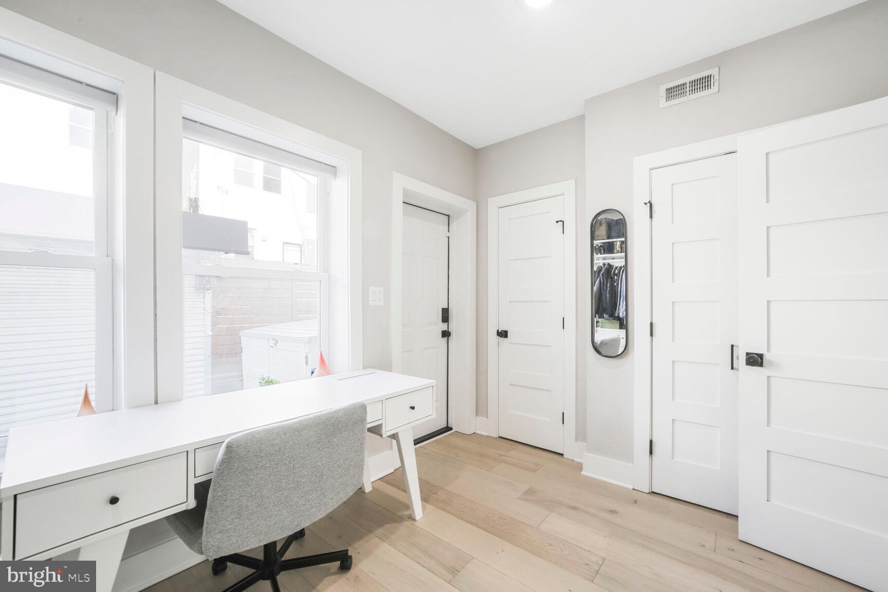 1144 Owen Place Northeast, Unit 1 Washington, DC 20002 - Photo 22 of 27 a very nice looking room with a large window