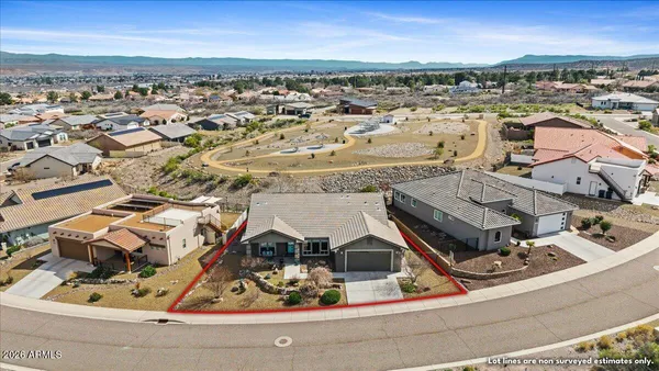 a view of a swimming pool with an outdoor seating