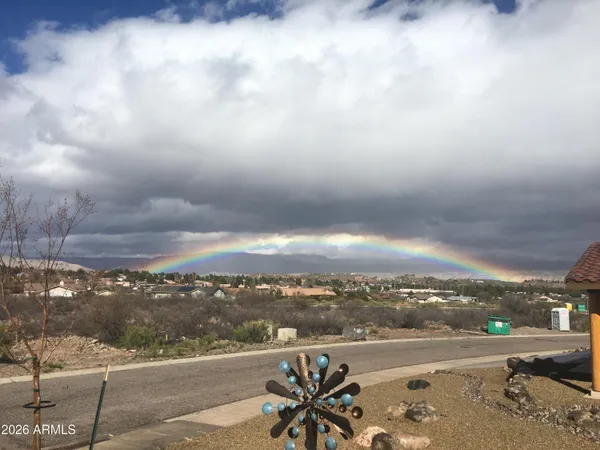 a view of a house with a street