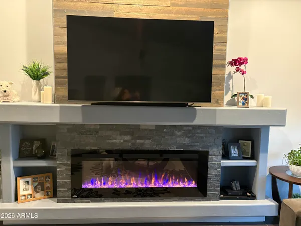 a room with furniture and a fireplace