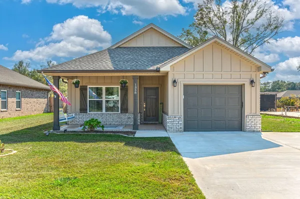 a view of a house with garden