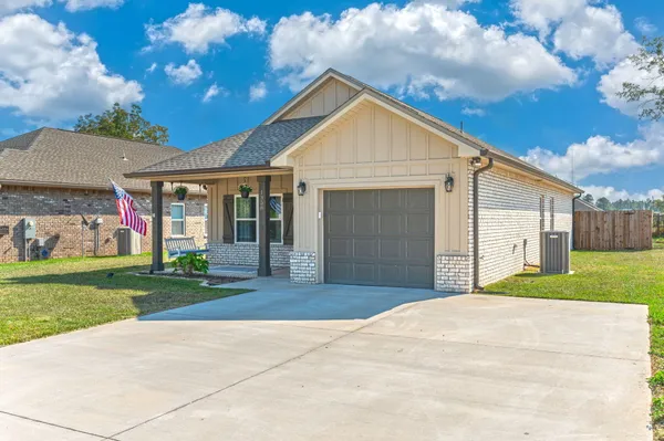 front view of a house and a yard