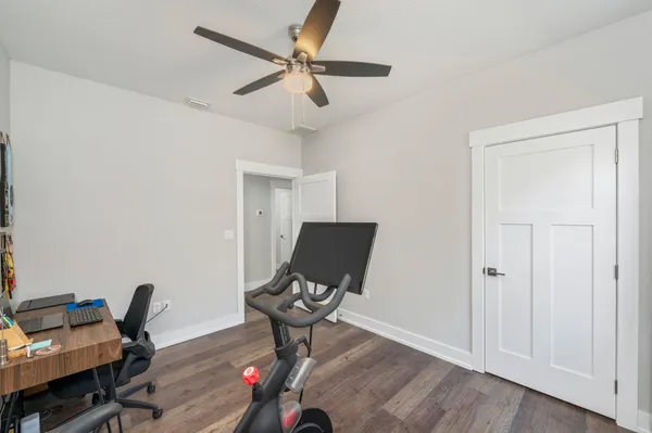 a view of a workspace with furniture