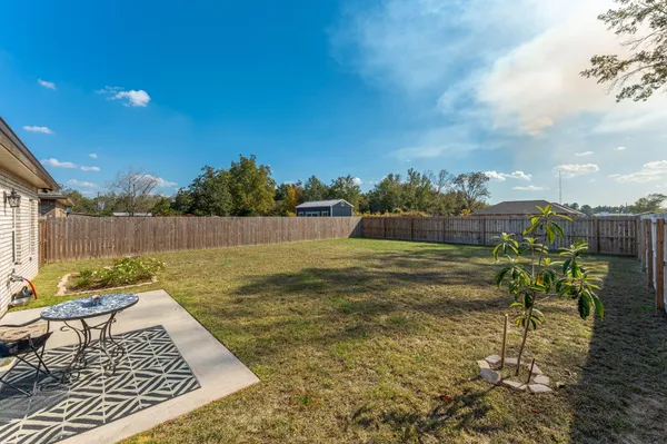 a view of a swimming pool with a lounge chairs
