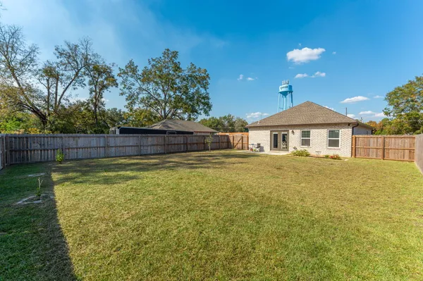 a front view of a house with swimming pool