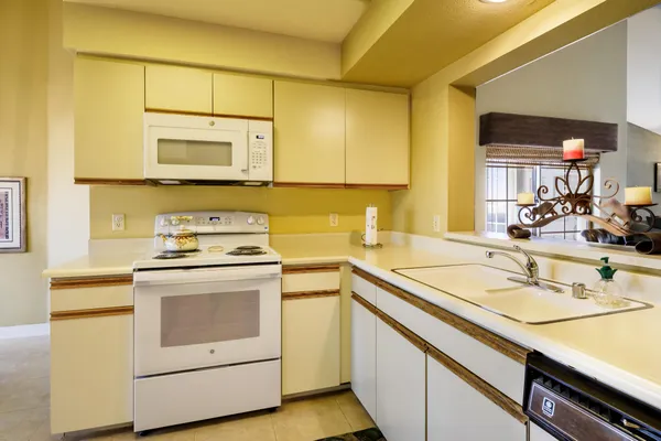 a spacious bathroom with a double vanity sink and a mirror