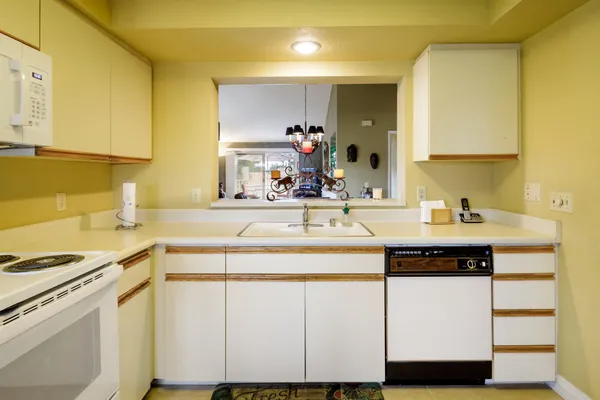 a bedroom with a bed and a table