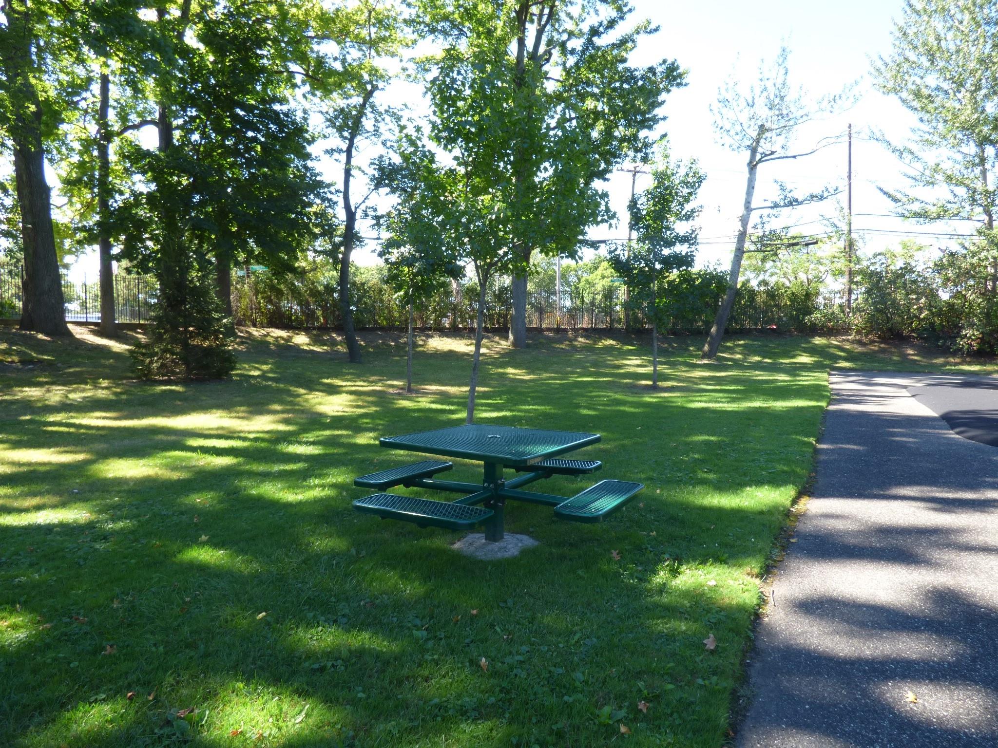 127 B Edgewater Park, Unit B Bronx, NY 10465 - Photo 20 of 26 a garden with trees in the background