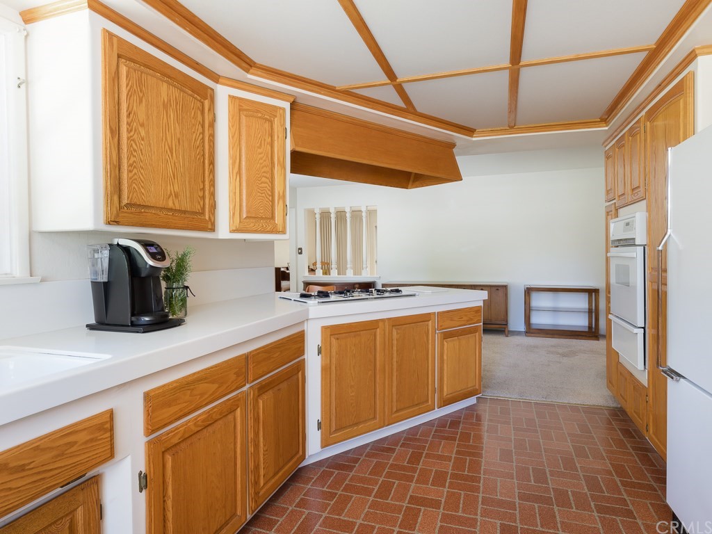 64 Ranchview Road Rolling Hills Estates, CA 90274 - Photo 12 of 38 a kitchen with stainless steel appliances granite countertop a sink a stove and a refrigerator
