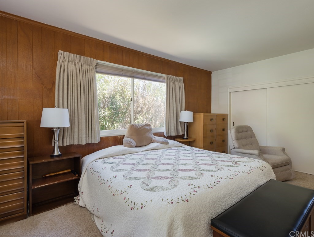 64 Ranchview Road Rolling Hills Estates, CA 90274 - Photo 16 of 38 a bedroom with a bed and a lamp