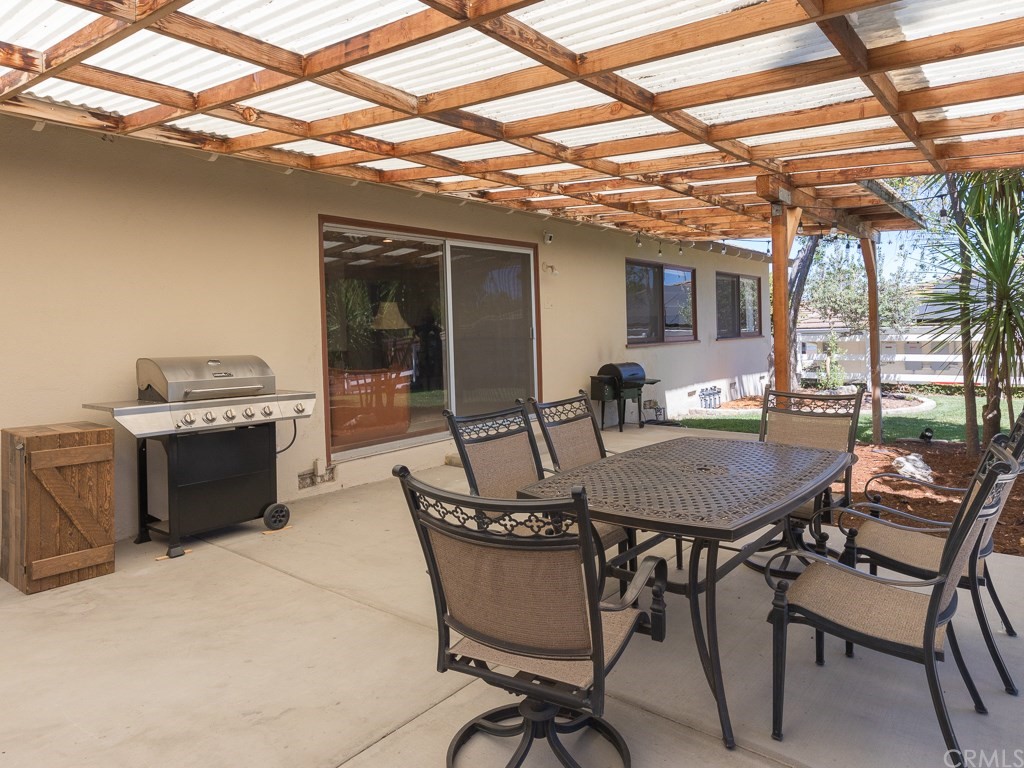 64 Ranchview Road Rolling Hills Estates, CA 90274 - Photo 23 of 38 a view of a dining room with furniture and a table