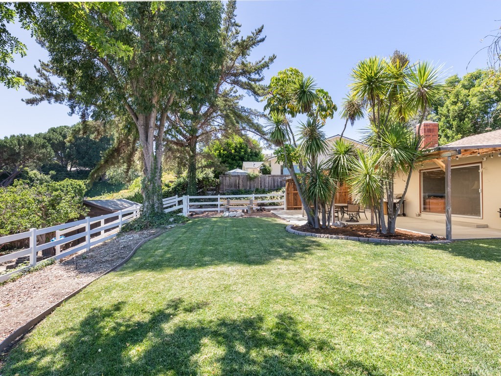 64 Ranchview Road Rolling Hills Estates, CA 90274 - Photo 25 of 38 a view of a house with backyard and a tree