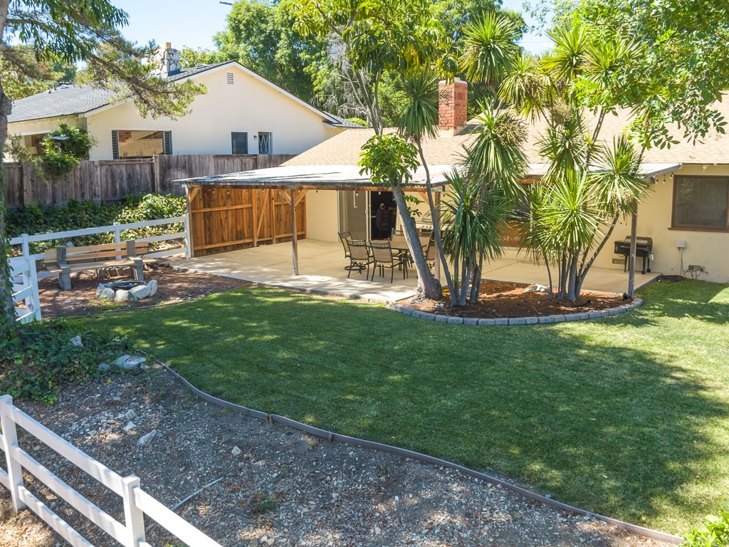 64 Ranchview Road Rolling Hills Estates, CA 90274 - Photo 27 of 38 a view of a house with backyard and a tree
