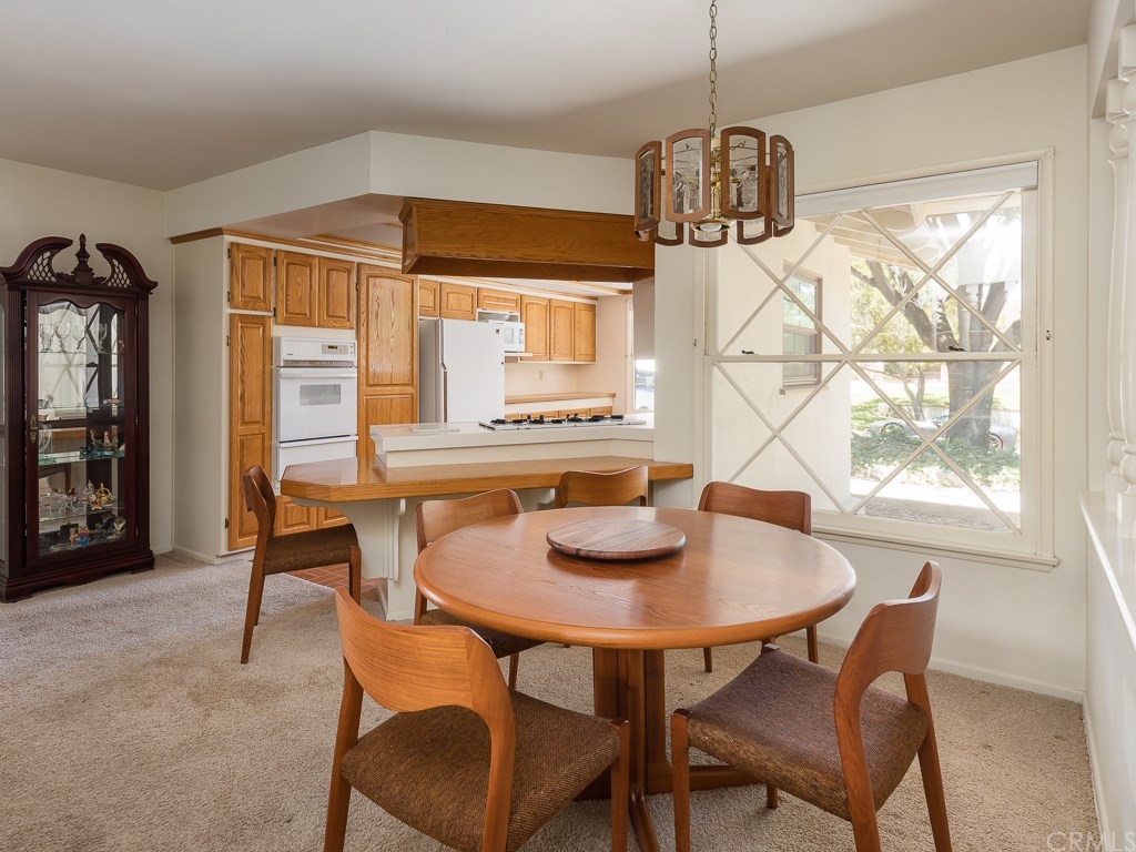64 Ranchview Road Rolling Hills Estates, CA 90274 - Photo 7 of 38 a dining room with furniture and window