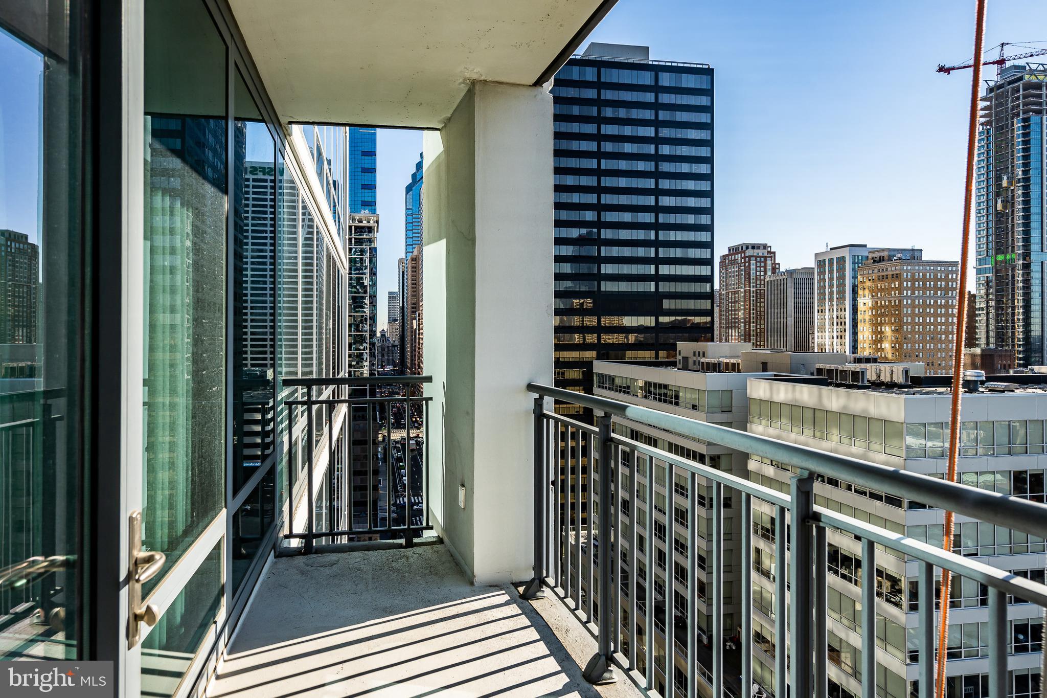 2101-00 Market Street, Unit 1803 Philadelphia, PA 19103 - Photo 41 of 52 a city view from a balcony