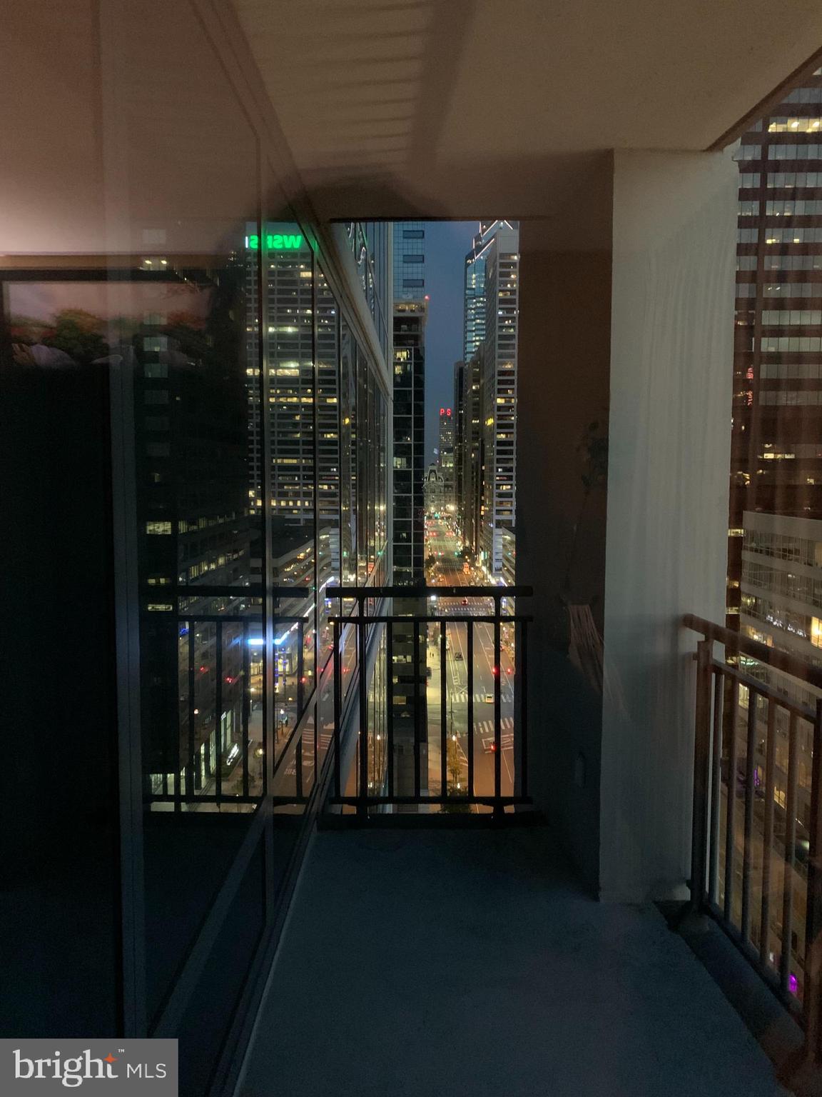 2101-00 Market Street, Unit 1803 Philadelphia, PA 19103 - Photo 48 of 52 a room with water heater and a table