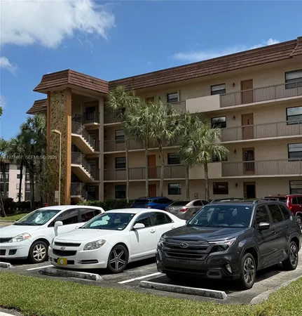 a cars parked in front of a building