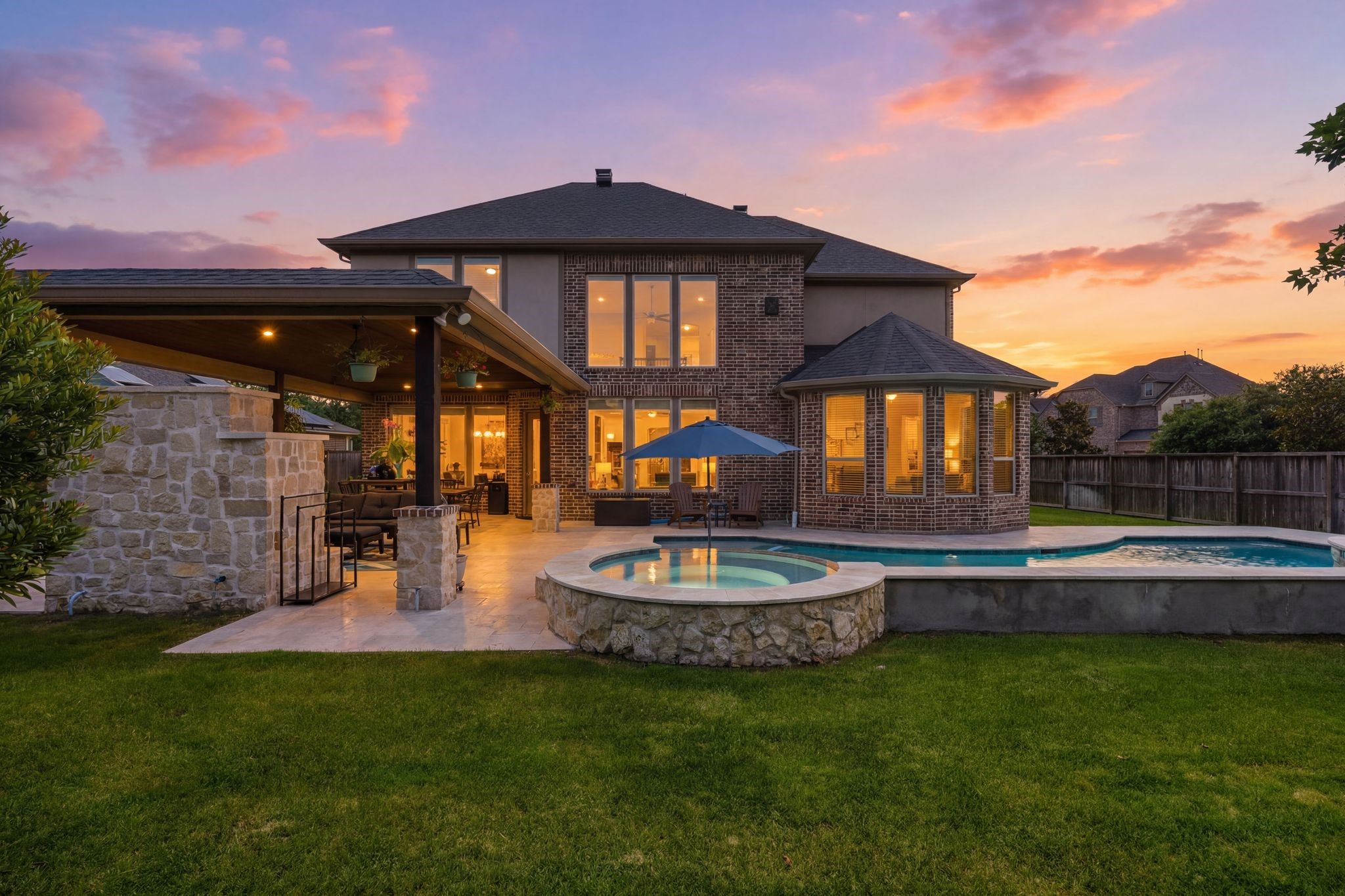 27705 South Slate Hills Lane Spring, TX 77386 - Photo 1 of 45 Stunning backyard retreat featuring a brand-new custom heated pool, spa, and elegant Travertine tile decking.