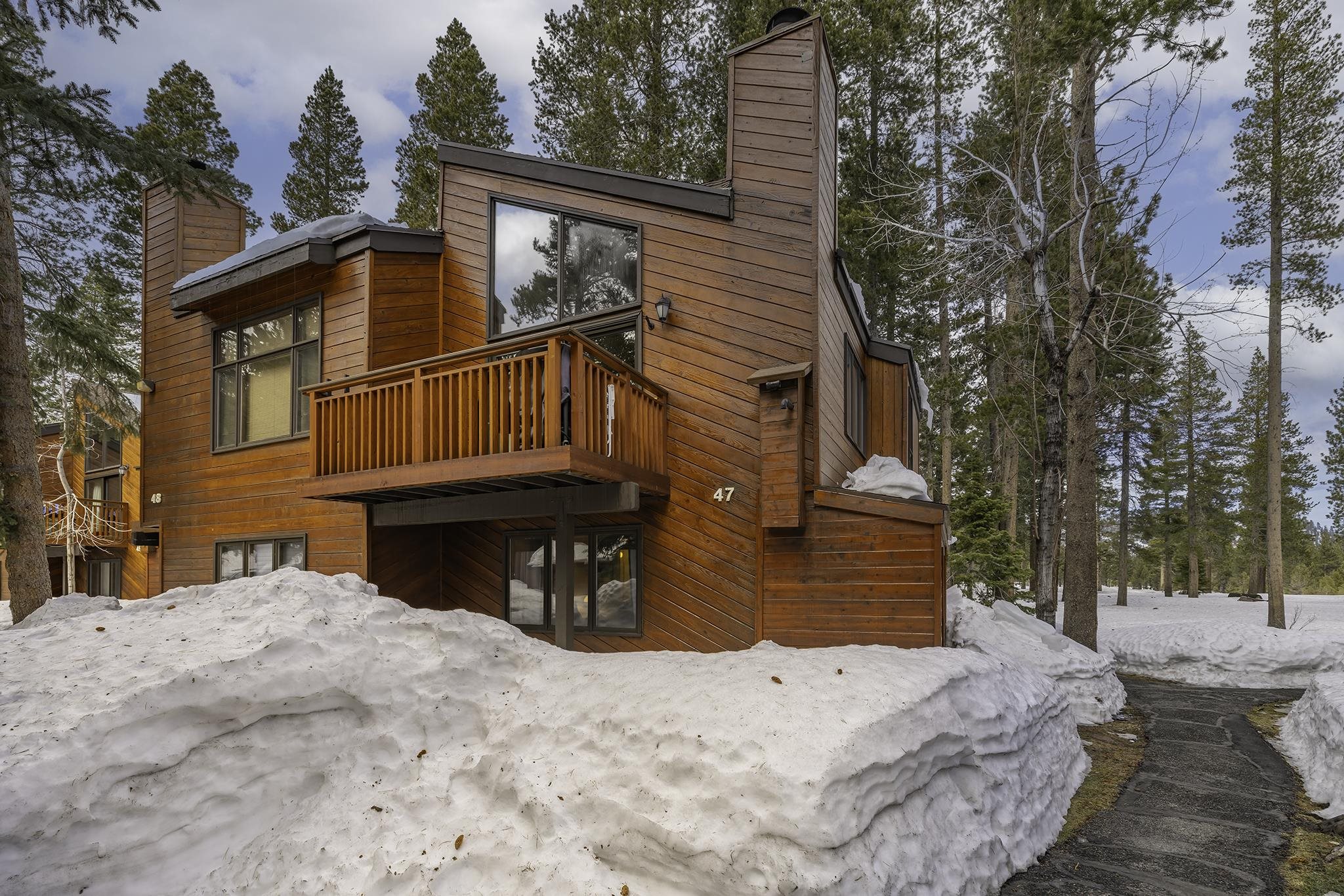 3005 Meridian Boulevard, Unit 47 Mammoth Lakes, CA 93546 - Photo 1 of 40 a view of a house with a yard covered in snow