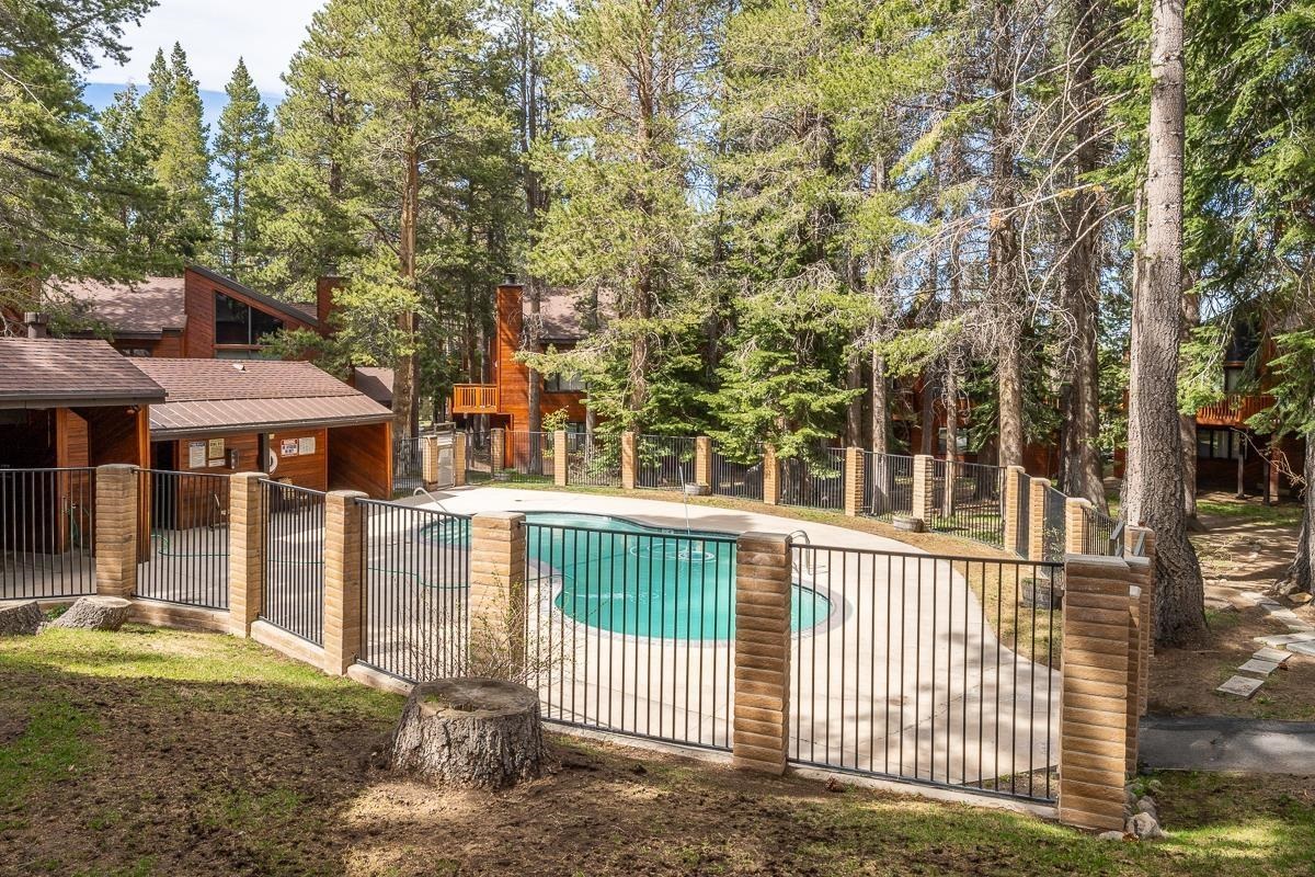 3005 Meridian Boulevard, Unit 47 Mammoth Lakes, CA 93546 - Photo 32 of 40 a view of a house with a iron gate