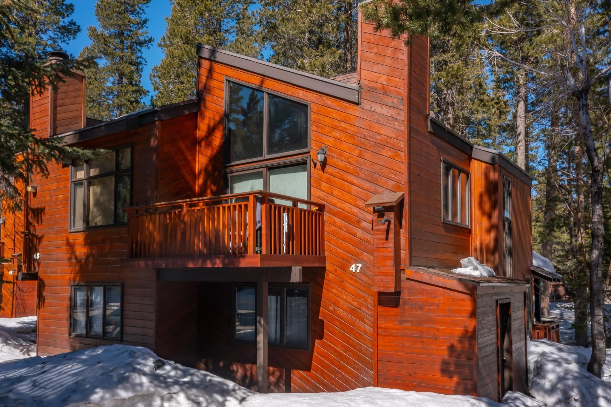 3005 Meridian Boulevard, Unit 47 Mammoth Lakes, CA 93546 - Photo 37 of 40 front view of a house with a large tree