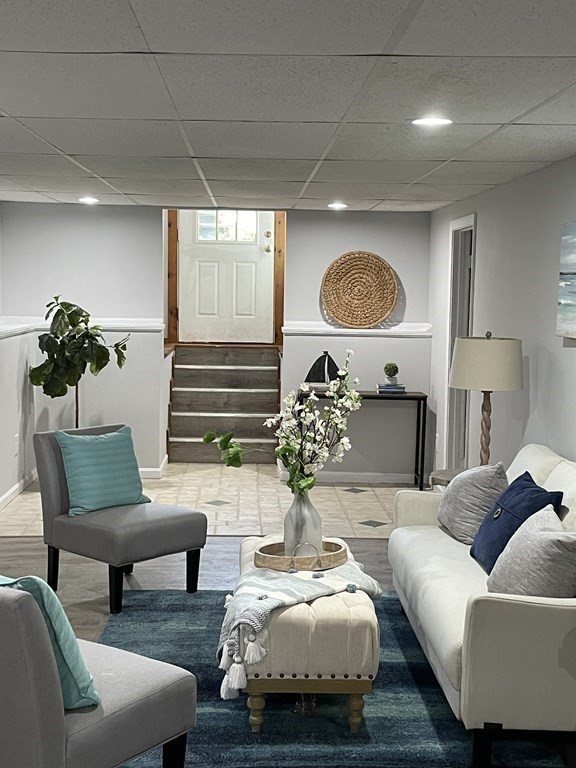 13 Ledge Road Norton, MA 02766 - Photo 16 of 22 a living room with furniture and a large window