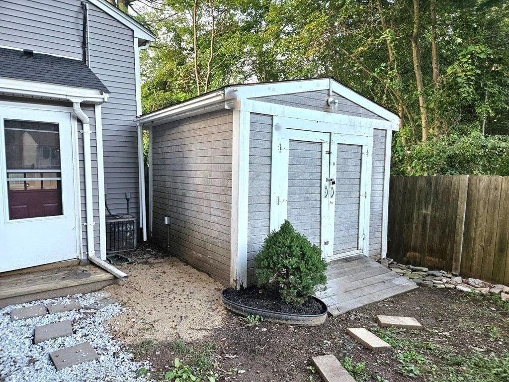 13 Ledge Road Norton, MA 02766 - Photo 21 of 22 a front view of a house with garden