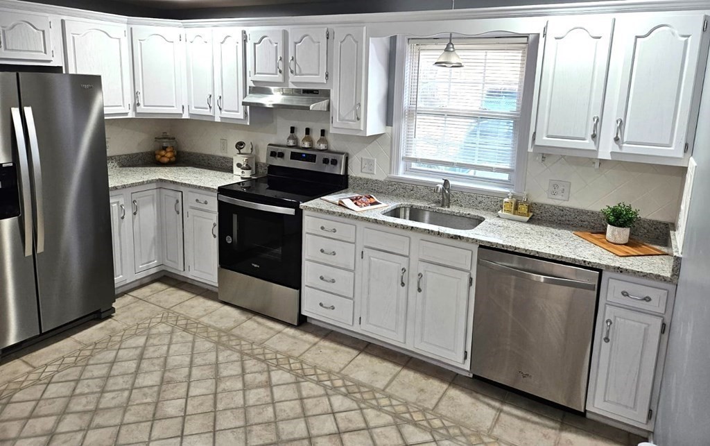 13 Ledge Road Norton, MA 02766 - Photo 3 of 22 a kitchen with stainless steel appliances granite countertop a sink a stove a refrigerator and cabinets