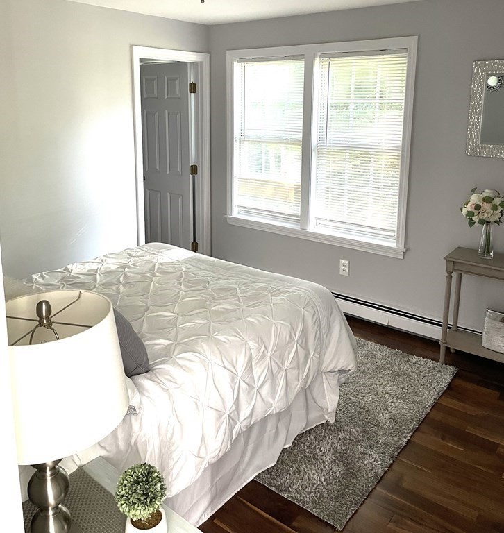 13 Ledge Road Norton, MA 02766 - Photo 10 of 22 a bedroom with a bed and a window