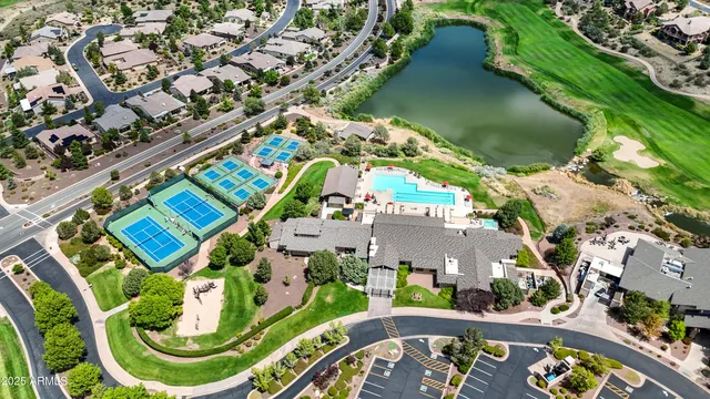 an aerial view of a city with mountains