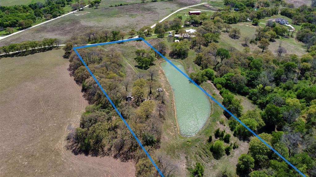 247 Private Road Covington, TX 76636 - Photo 35 of 38 Bird's eye view with a rural view and a water view