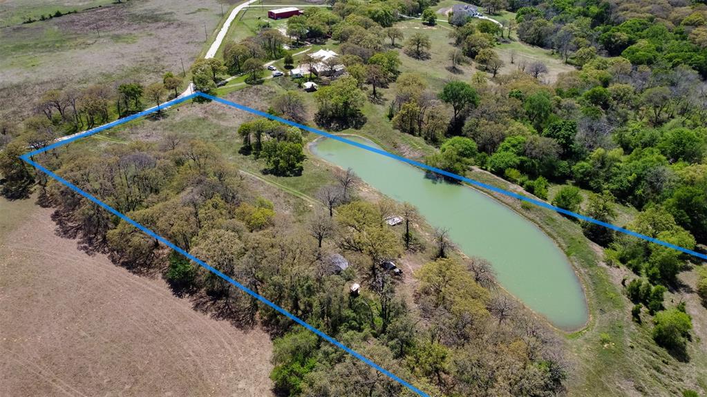 247 Private Road Covington, TX 76636 - Photo 36 of 38 Bird's eye view with a water view
