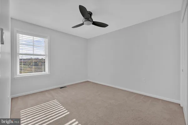 a view of a livingroom with a staircase
