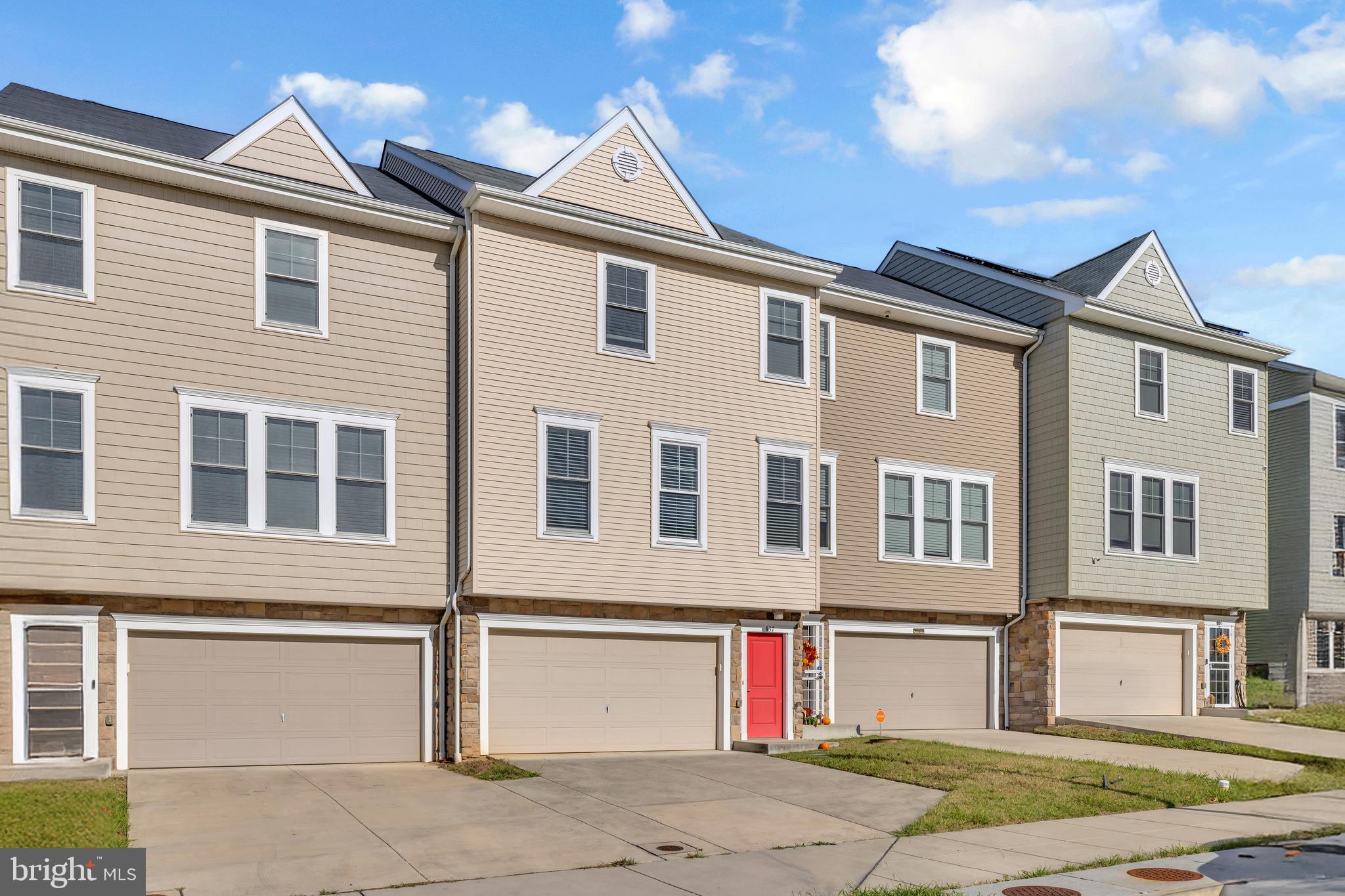 437 Woodcrest Drive Southeast Washington, DC 20032 - Photo 3 of 38 a front view of a house