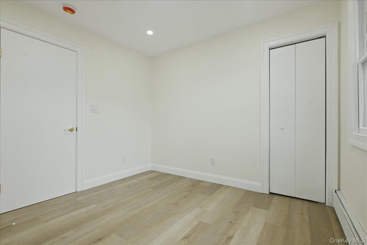 84 North Fordham Road Hicksville, NY 11801 - Photo 14 of 28 a view of an empty room