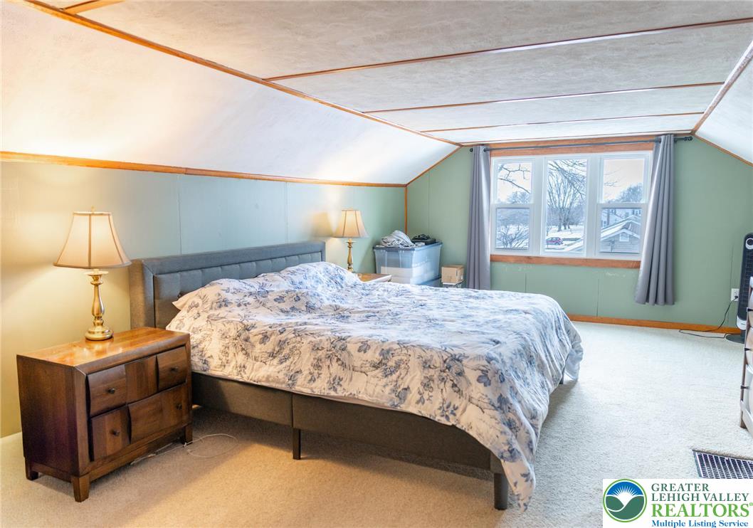 664 Locke Heights Road Bangor, PA 18013 - Photo 12 of 20 a bedroom with a bed and a window