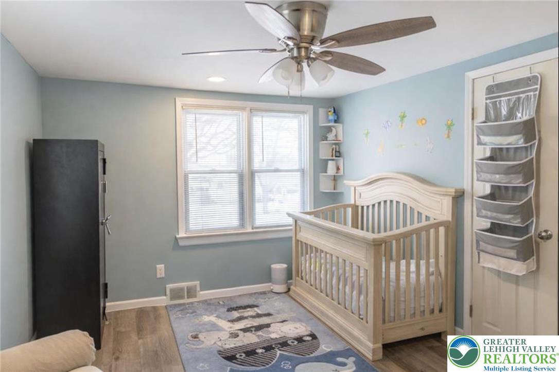 664 Locke Heights Road Bangor, PA 18013 - Photo 7 of 20 a bedroom with a bed and a window