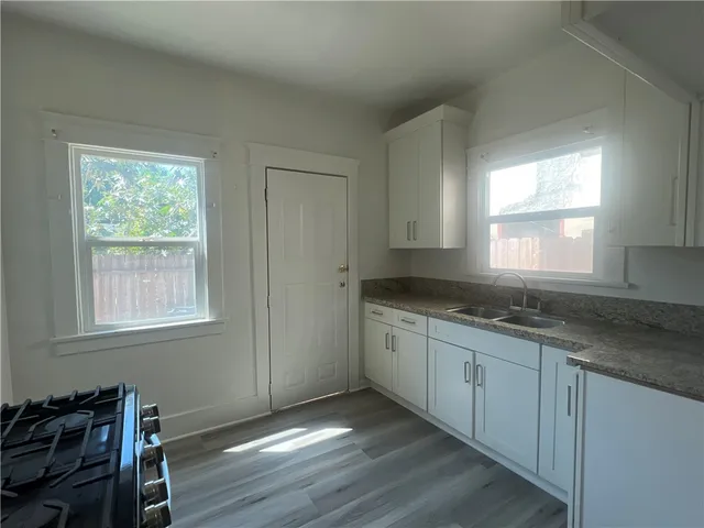 a view of a house with wooden floor