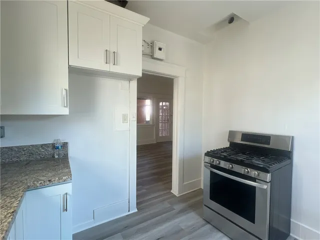 a picture of a bench in a kitchen