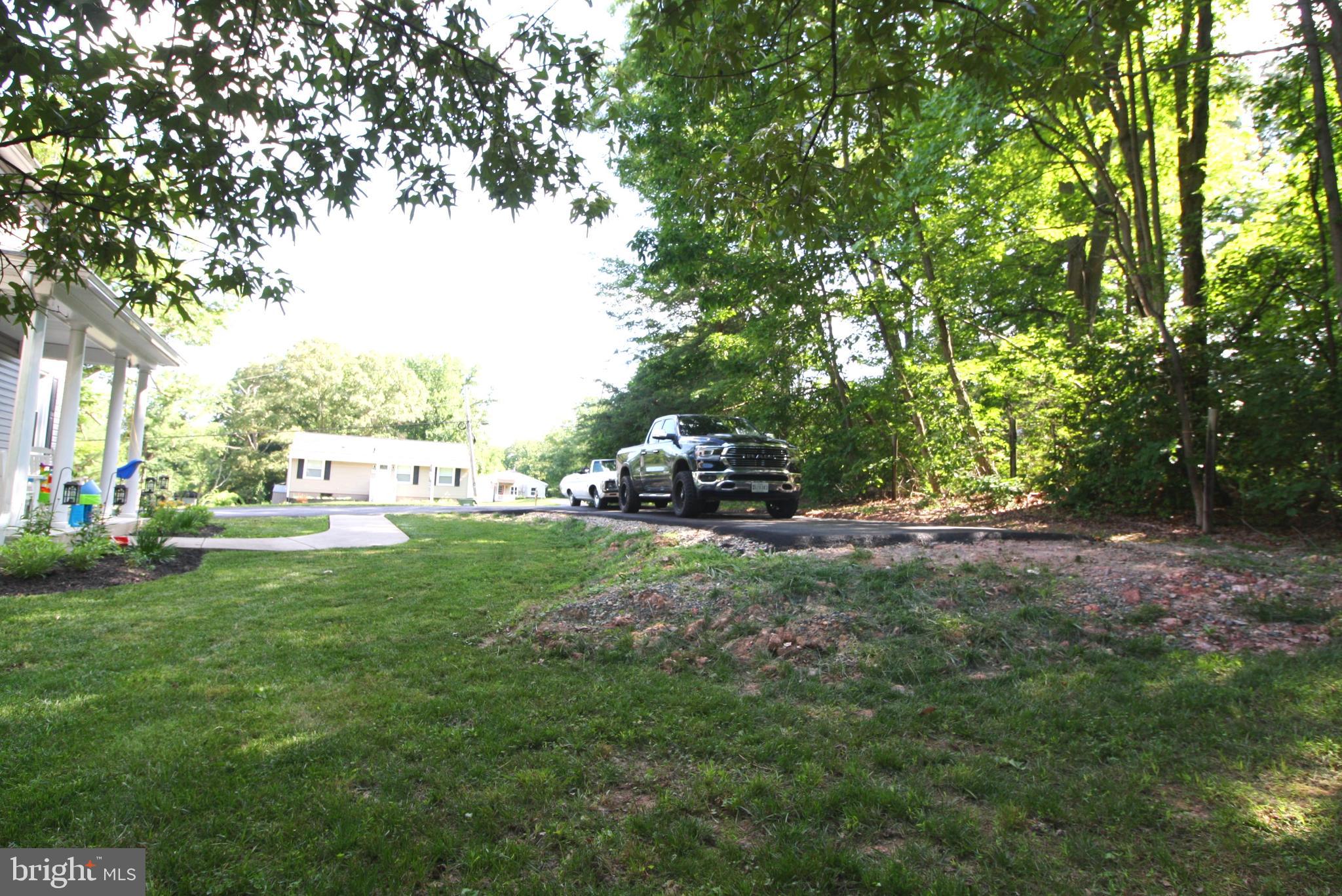 2024 Singer Road Joppa, MD 21085 - Photo 4 of 52 Front Yard New Parking Pad