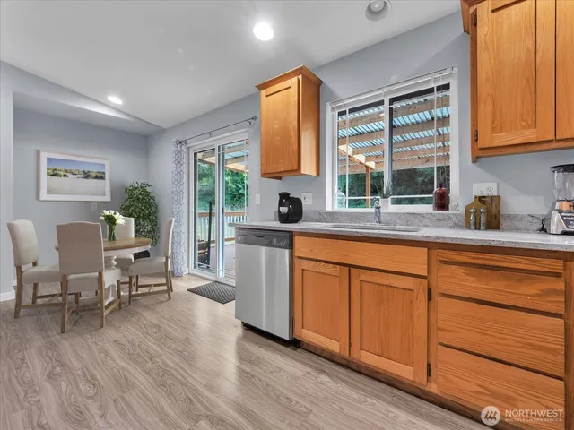 a view of kitchen with wooden floor
