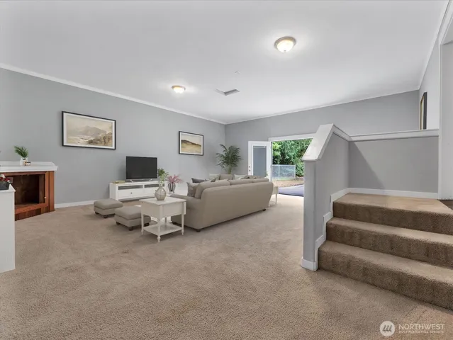 a living room with furniture and a couch