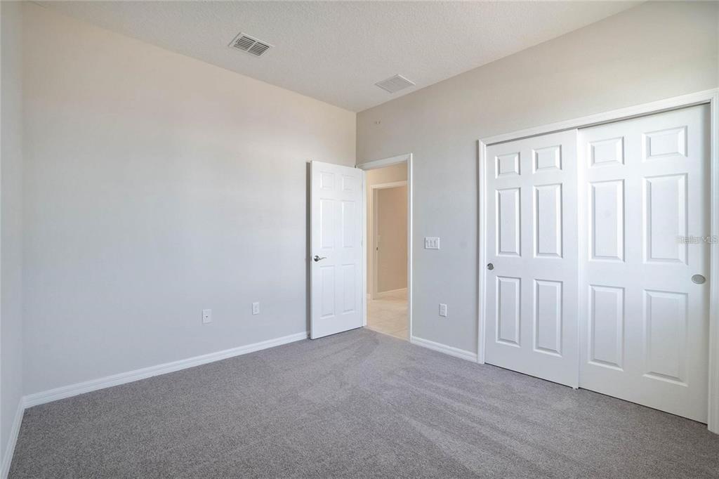 715 Poller Way Cocoa, FL 32927 - Photo 14 of 19 an empty room with windows